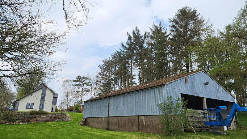 Corrugated cement bonded asbestos roof sheet removal and disposal near Selkirk in the Scottish Borders, contact Brown Demolitions for an asbestos removal quote in Scotland, click here and view the latest asbestos project